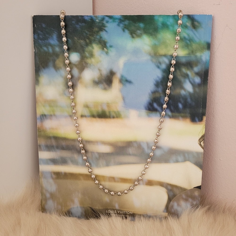 Silver Necklace with Delicate Bead Accents